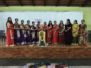 Mitre Cosmo Club president Shrirajini Dattatri lighting the lamp at the Dasareya Deepa programme in Shivamogga