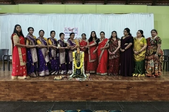 Mitre Cosmo Club president Shrirajini Dattatri lighting the lamp at the Dasareya Deepa programme in Shivamogga